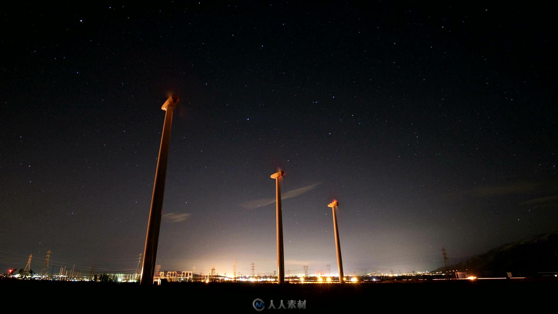 夜晚的风力发电机组延时视频素材